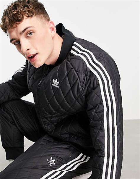 adidas Originals – adicolor – Trainingsjacke in Schwarz mit 